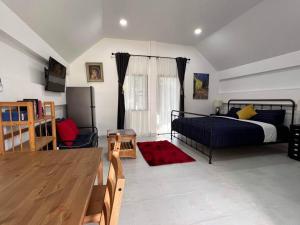 Charming Villa Suite with Balcony near Beach