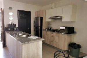 La casa del faro Azul Marino