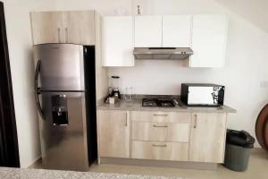 La casa del faro Azul Marino