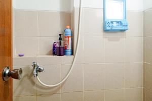 RedLiving Apartemen LoftVilles City - Pelangi Rooms