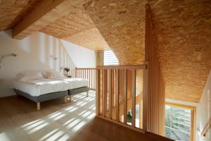 Appart'hotels La Ferme Des Ailleurs : photos des chambres