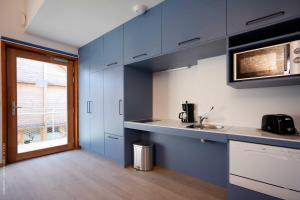 Appart'hotels La Ferme Des Ailleurs : photos des chambres