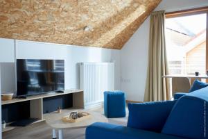Appart'hotels La Ferme Des Ailleurs : photos des chambres