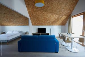 Appart'hotels La Ferme Des Ailleurs : photos des chambres