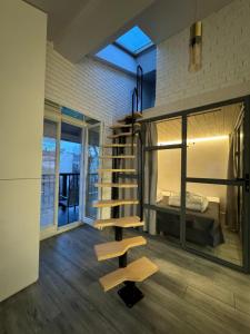 Balcony Bliss Main Square Loft