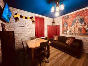 Appartements Le Logis Des Sorciers : photos des chambres