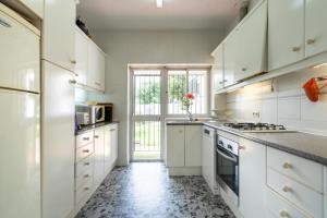 Family villa with garden next to the beach