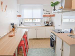 Appartements Cosy Mirabelle 2CH - Parc Expo - Balcon & Parking : photos des chambres