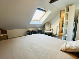 Appartements Le Pigeonnier : photos des chambres