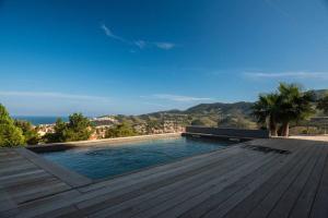 Appartements Grande villa avec vue mer et montagne, 5 etoiles c : photos des chambres
