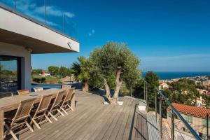 Appartements Grande villa avec vue mer et montagne, 5 etoiles c : photos des chambres