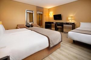 Twin Room with Extra Bed (3 Adults) room in HCC St. Moritz