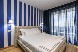 Status-M Apartments WOW