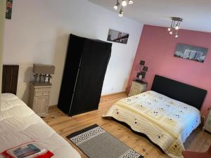 Maisons de vacances Le Pressoir Sainte Mere Eglise : photos des chambres