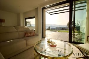 Casa do Golfe by VinteOito