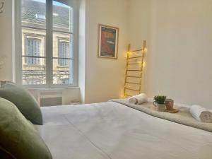 Appartements Le Petit Cosy - T2 en hypercentre, parking prive : photos des chambres