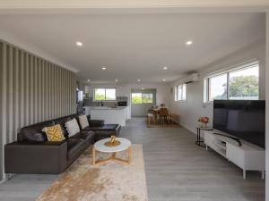 Convenient Comfort 4BR near Malls and Transport