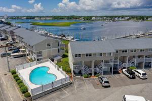 Canal-Front w Boat Slip | Pool + Walk to Beach