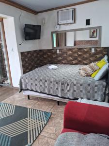 Pousada Marambaia Café - Praiana, econômica, Com café da manhã, piscina e hidromassagem ao ar livre - Frente para o mar