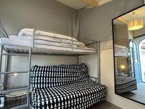 Maisons de vacances Maison confortable face a la mer, 7 couchages, terrasse, jardin, wifi, parking, animaux acceptes - FR-1-224B-211 : photos des chambres