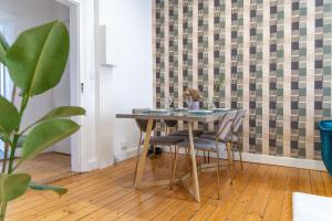 Appartements Plumeria - Grand Appartement 75m2 - Au calme - Proche Gare, Nouvelle Ville - Parking Public Gratuit - 2 Chambres - 4 Lits separes : photos des chambres