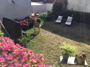 Sejours chez l'habitant LE CHARDONNAY Grand Cru : Chambre Double - Vue sur Jardin