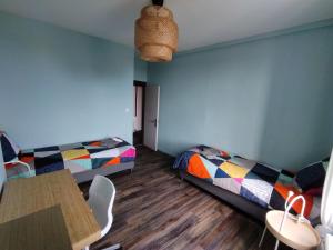 Appartements VOLVIC HOME : photos des chambres