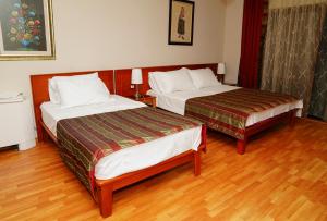 Triple Room with Sea View room in Bella Napoli Hotel