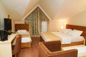 Triple Room with Sea View room in Bella Napoli Hotel