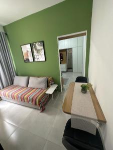 Acolhedor apartamento na quadra da praia