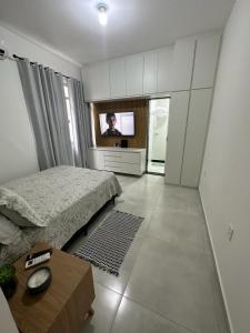 Acolhedor apartamento na quadra da praia