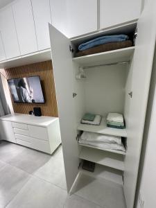 Acolhedor apartamento na quadra da praia