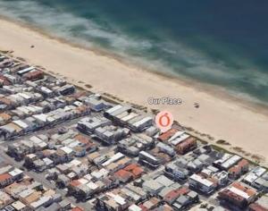 Stay around the corner from the Manhattan Beach Strand