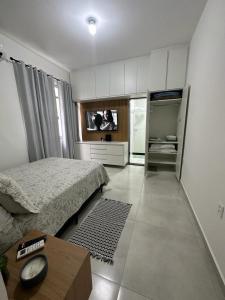 Acolhedor apartamento na quadra da praia