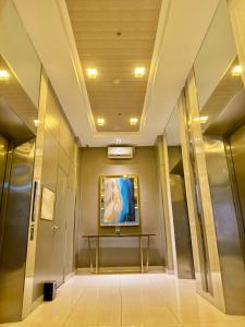 Urban Oasis Condo 1 Bedroom Facing Pool Area only steps away from Ayala Mall