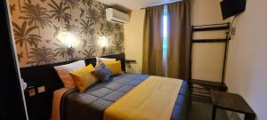 Hotels Hotel L'Etoile Aeroport - A61 : photos des chambres