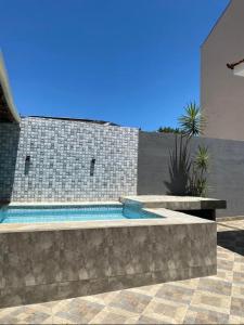 Casa agradável com pequena piscina !