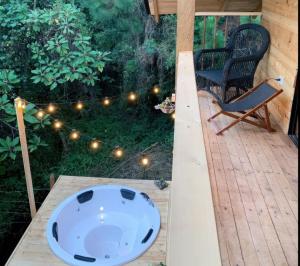 Cabaña con Jacuzzi privadoBBQ y Chimenea ecológica