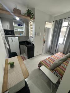 Acolhedor apartamento na quadra da praia