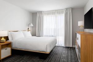 One-Bedroom Queen Suite with Sofa Bed room in TownePlace Suites by Marriott Iron Mountain