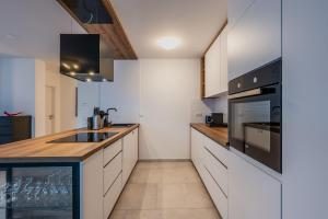 EXQUIS Luxus Apartment USM I Kamin I Terrasse I Parkplatz I Mercedes