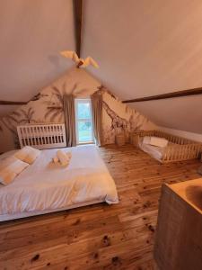Villas Magnifique maison au coeur d-un jardin paysager : photos des chambres