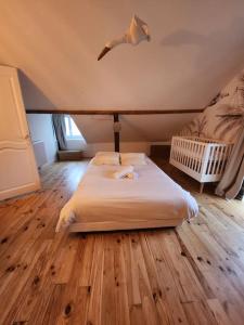 Villas Magnifique maison au coeur d-un jardin paysager : photos des chambres