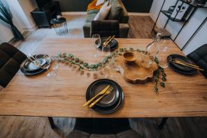 Appartements Le Bertrand • Le Raffinement en Coeur de Ville : photos des chambres