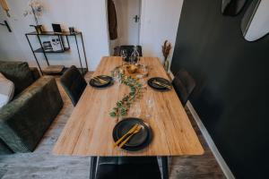 Appartements Le Bertrand • Le Raffinement en Coeur de Ville : photos des chambres