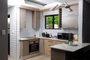 Uptown Apartments - Garden Pavillion - Boschrand