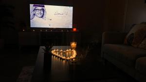 شقه (غرفه+صاله)مطله على المركز المالي بدخول ذاتي