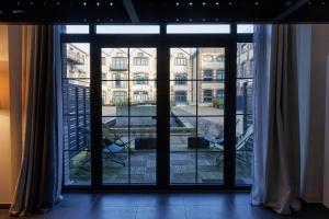 Appartements Manhattan Loft - centre - 5 mn a pied gare - parking prive - patio : photos des chambres