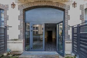 Appartements Manhattan Loft - centre - 5 mn a pied gare - parking prive - patio : photos des chambres