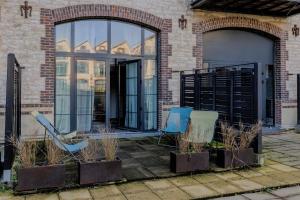 Appartements Manhattan Loft - centre - 5 mn a pied gare - parking prive - patio : photos des chambres